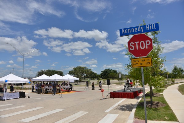 The project expanded the roadway to three lanes, one in either direction with a center turn lane, to meet city standards. Other improvements include the addition of bike lanes, six to 12-foot sidewalks and more than 250 new trees.